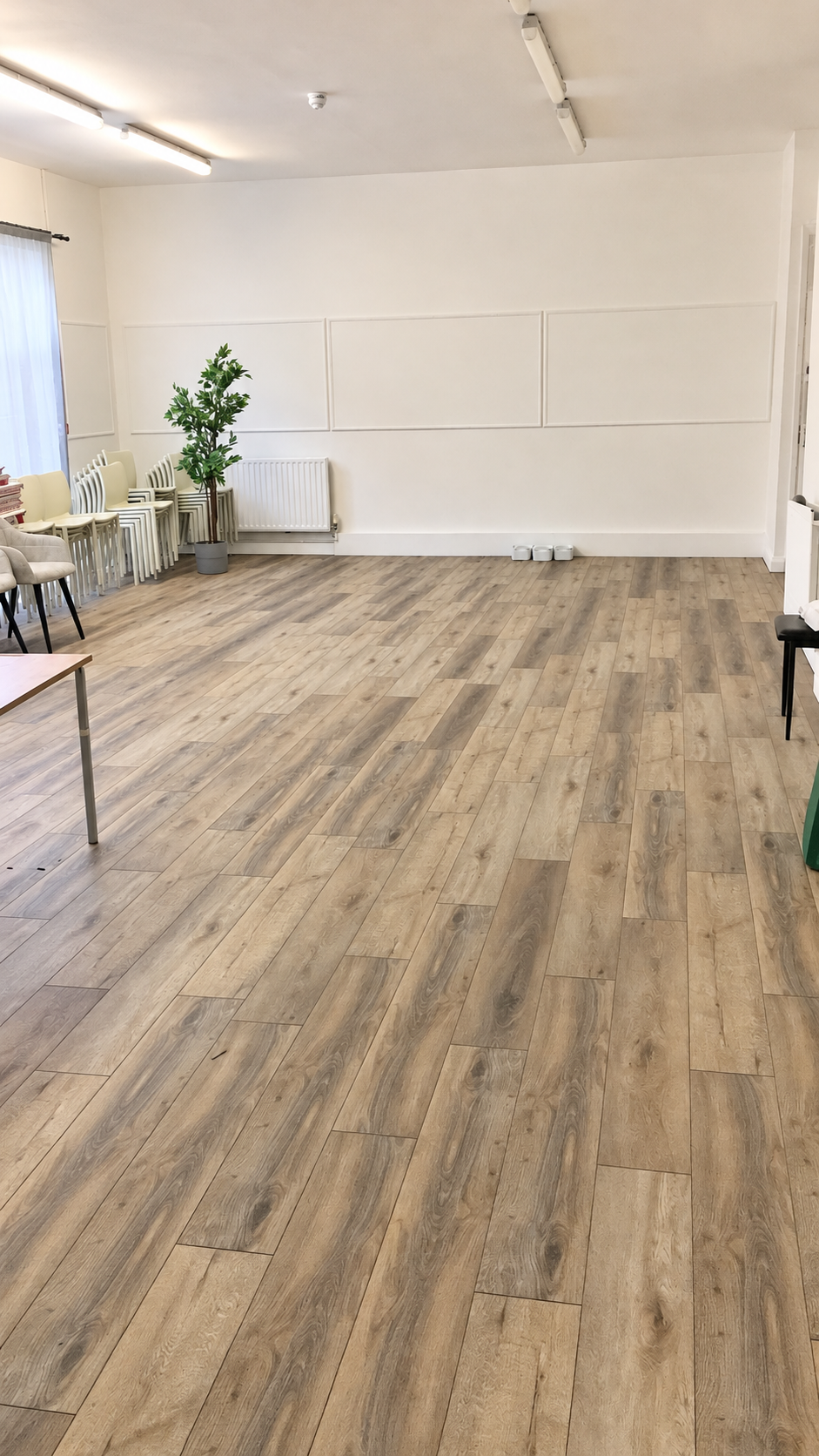Brightened photograph showing the open floor space in Deronda Hall