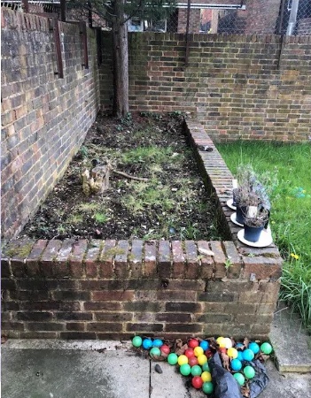 The garden bed prepared for work to begin.
