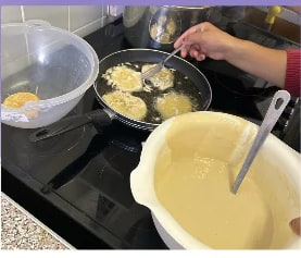 Participants prepared different dishes and learned from one another.